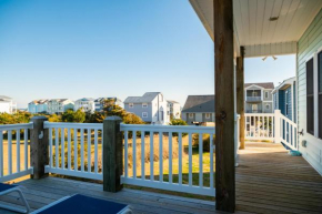 A Pawsitive Attitude by Oak Island Accommodations